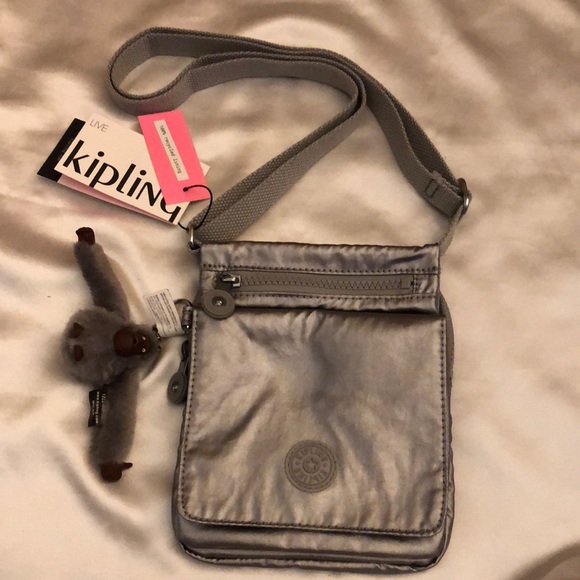 Kipling NWELDORADO Smooth Silver Metallic Crossbody With Monkey Key Chain NWT - Picture 16 of 16
